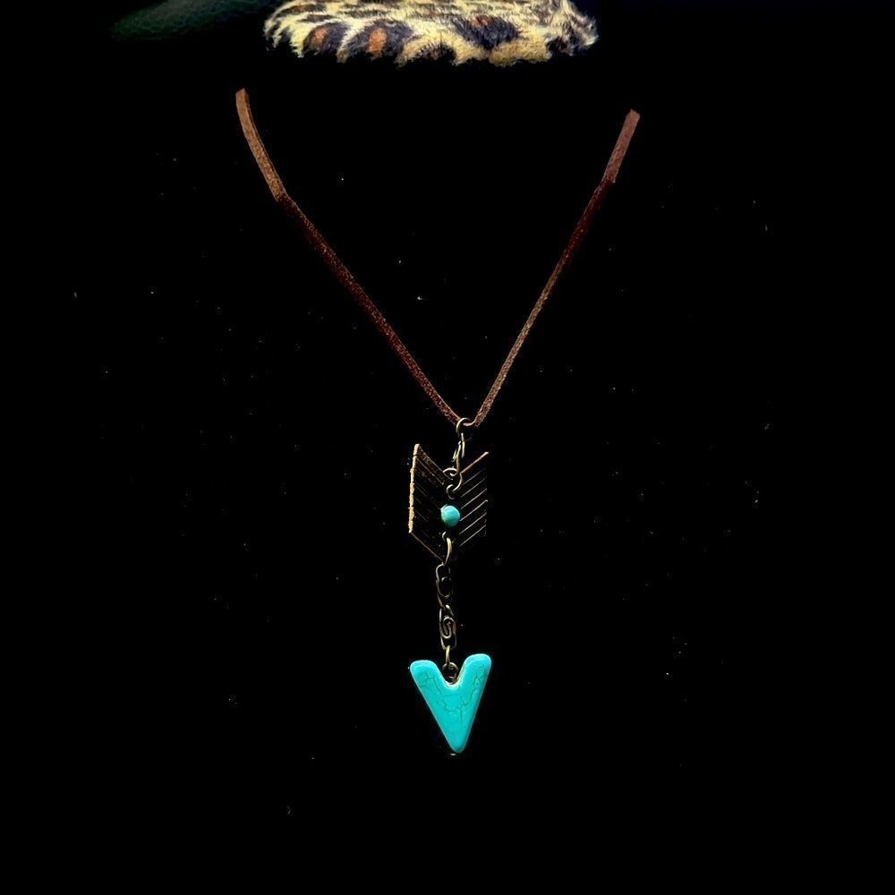 Brown necklace with arrow